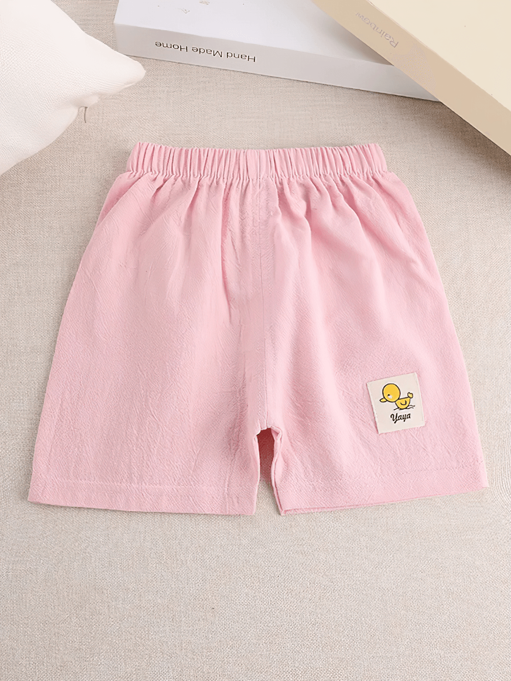 Pink Kids Lightweight Shorts with Cute Patch Detail - SF3755 featuring elastic waistband and playful patch on beige background