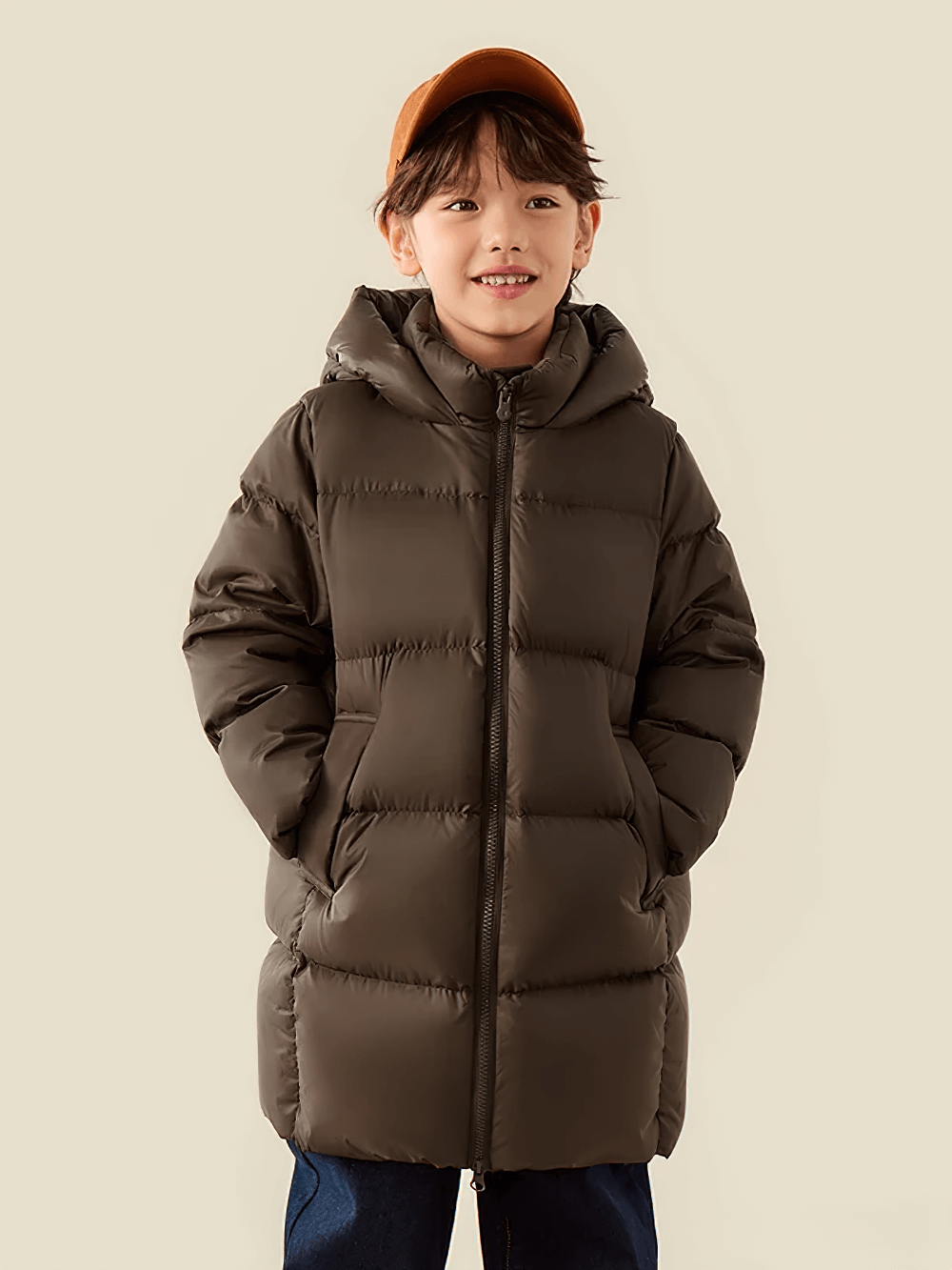 Smiling child wearing a Kids Long Down Parka with Hood and Windproof Design - SF3511, perfect for winter weather.