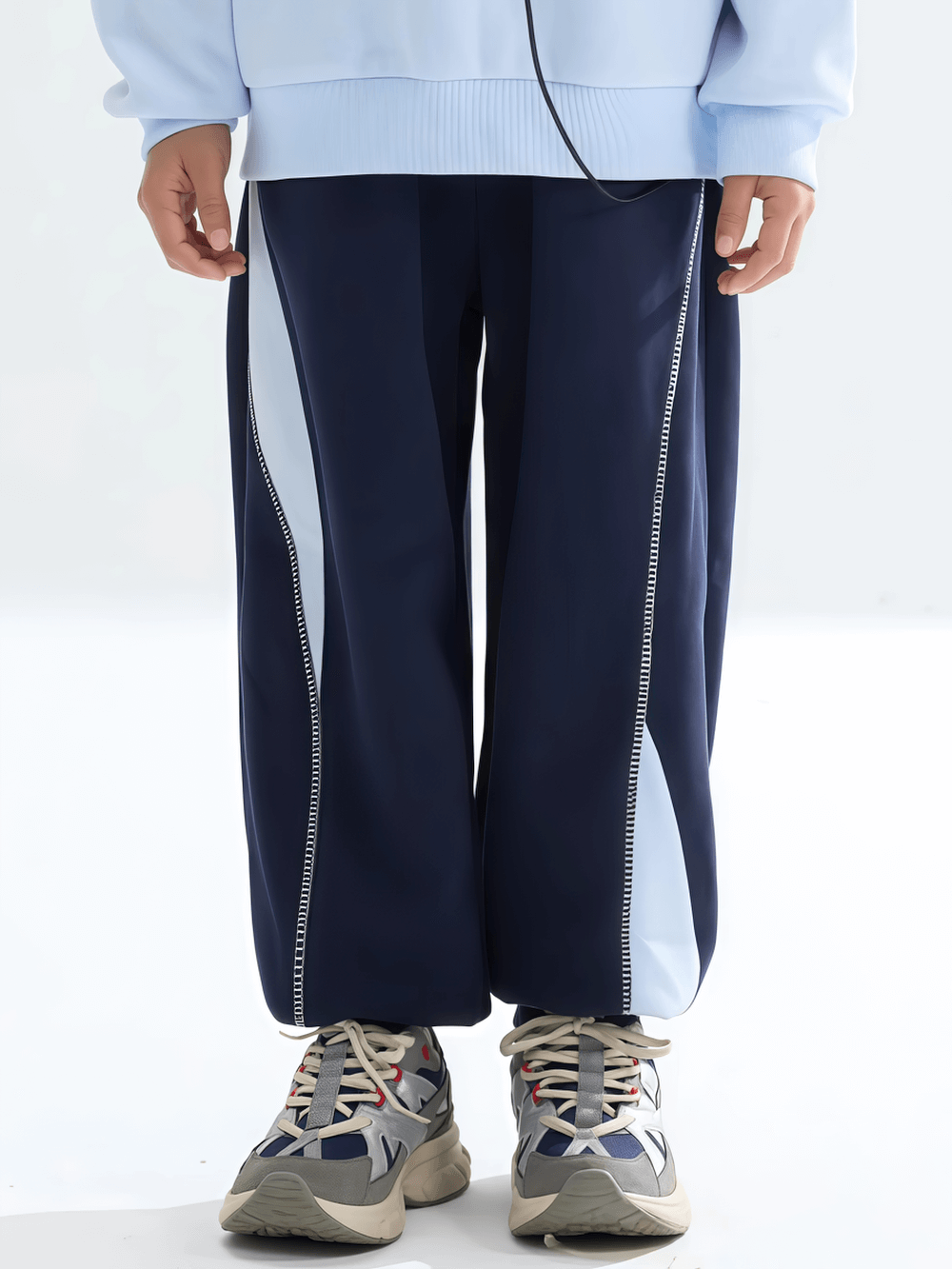 Kid wearing Kids Loose Jogger Pants with Elastic Waistband - SF3739, featuring patchwork design and comfy fit for active play.