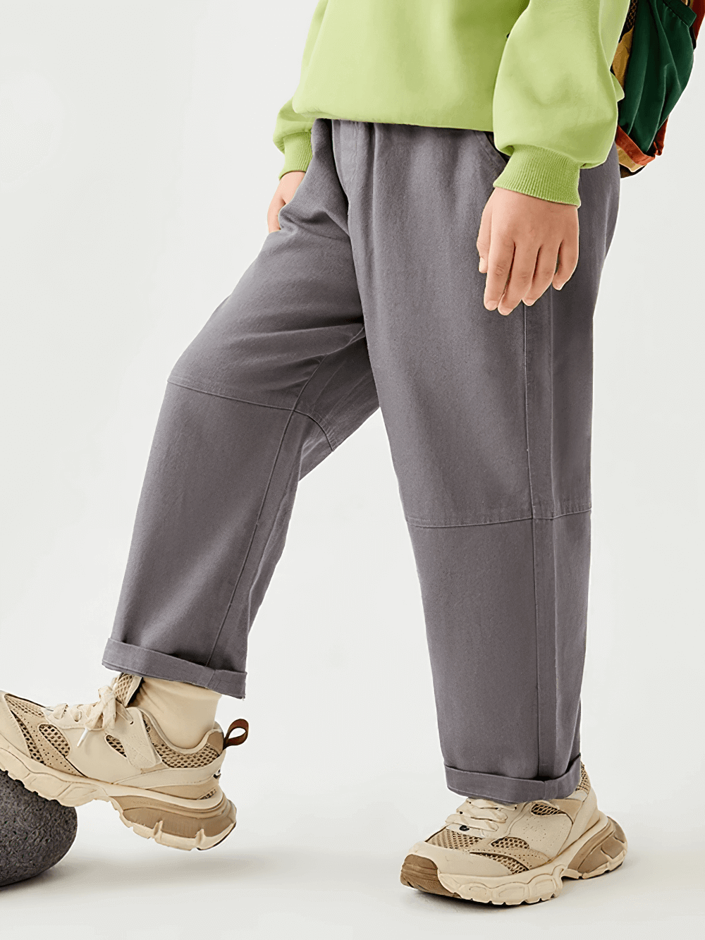 Child wearing Kids Loose Sport Trousers with Elastic Waist - SF3801, showcasing soft cotton, loose fit, ideal for active play.