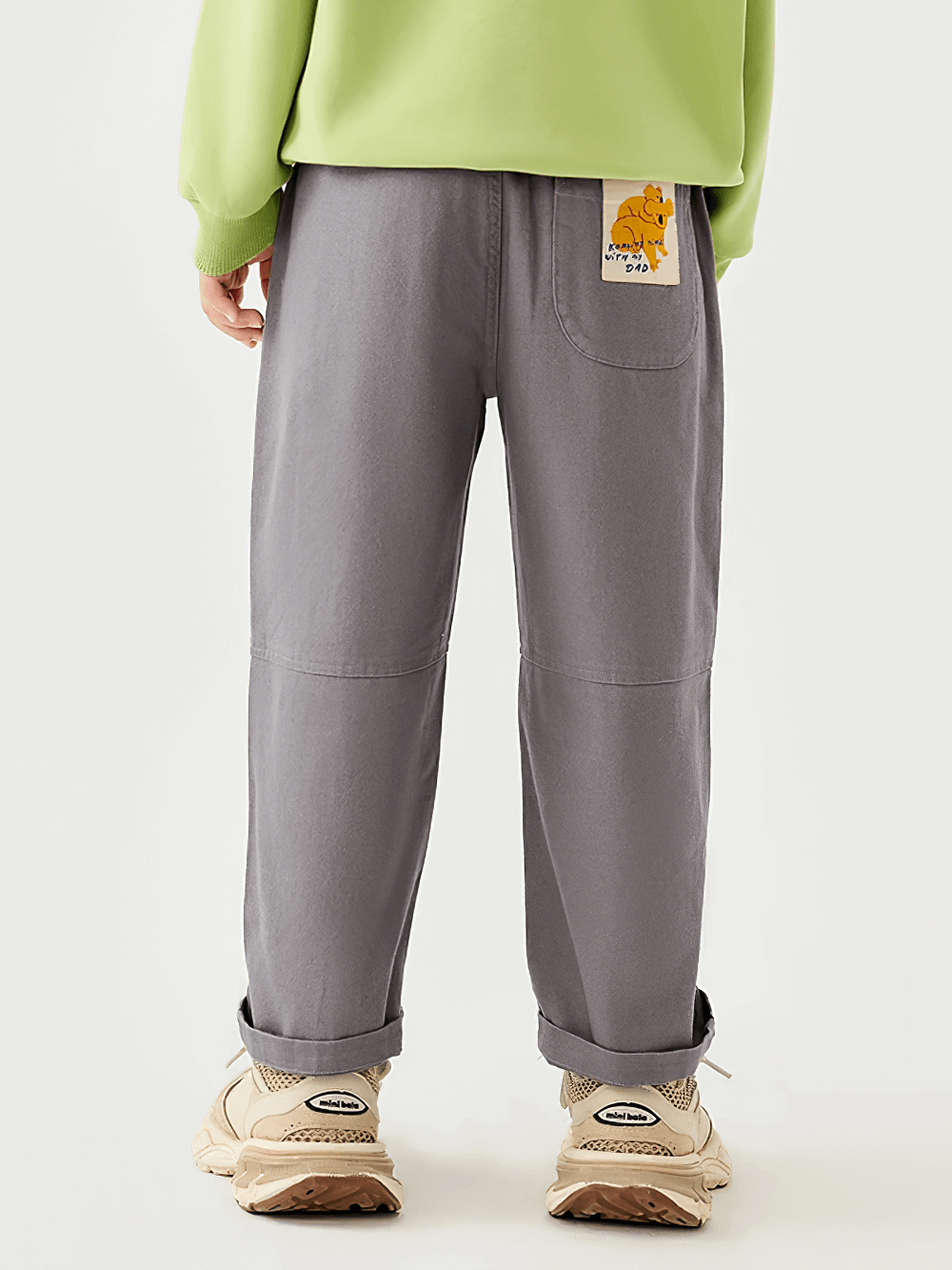 Back view of Kids Loose Sport Trousers with Elastic Waist - SF3801 in soft cotton, featuring pockets and relaxed fit for active daily wear.