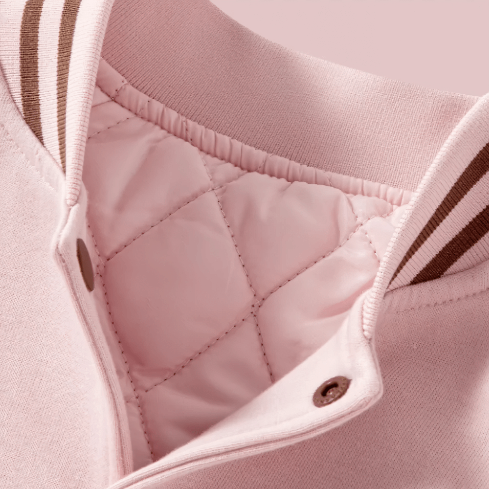 Close-up of Kids Padded Baseball Jacket with Snap Buttons - SF3866 showing interior lining and collar details in soft pink color.
