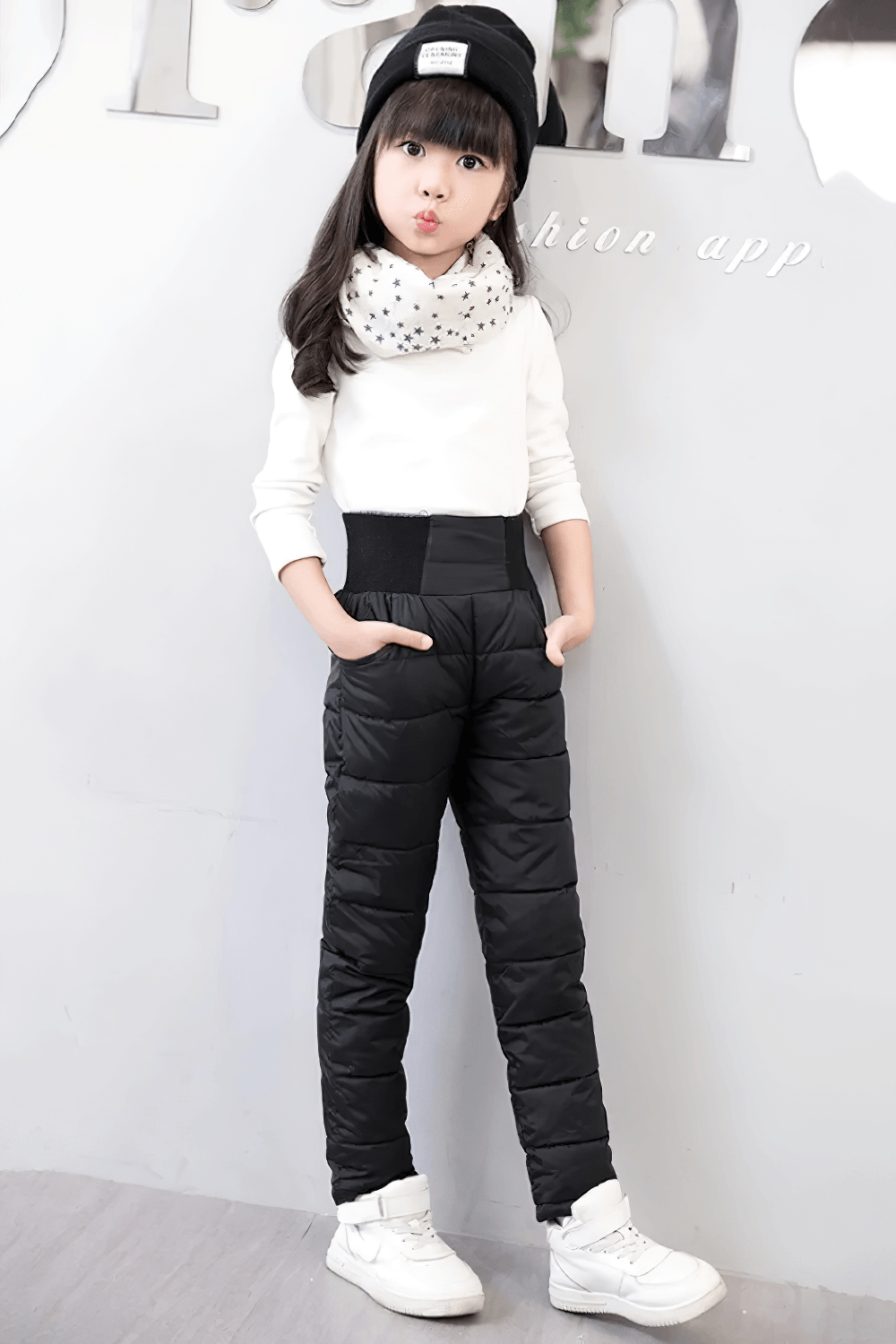 Child wearing Kids Padded Pants with Elastic High Waist - SF3753, perfect for cold weather with thick, waterproof insulation.