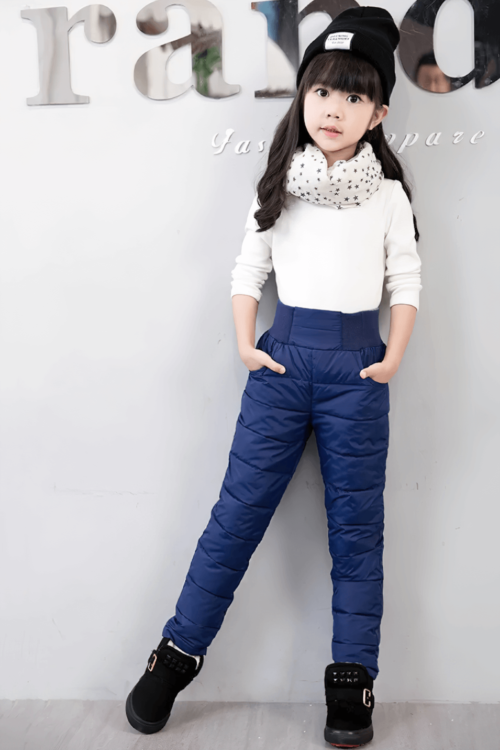 Child wearing Kids Padded Pants with Elastic High Waist - SF3753, featuring a stylish design for cold weather, perfect for outdoor play.