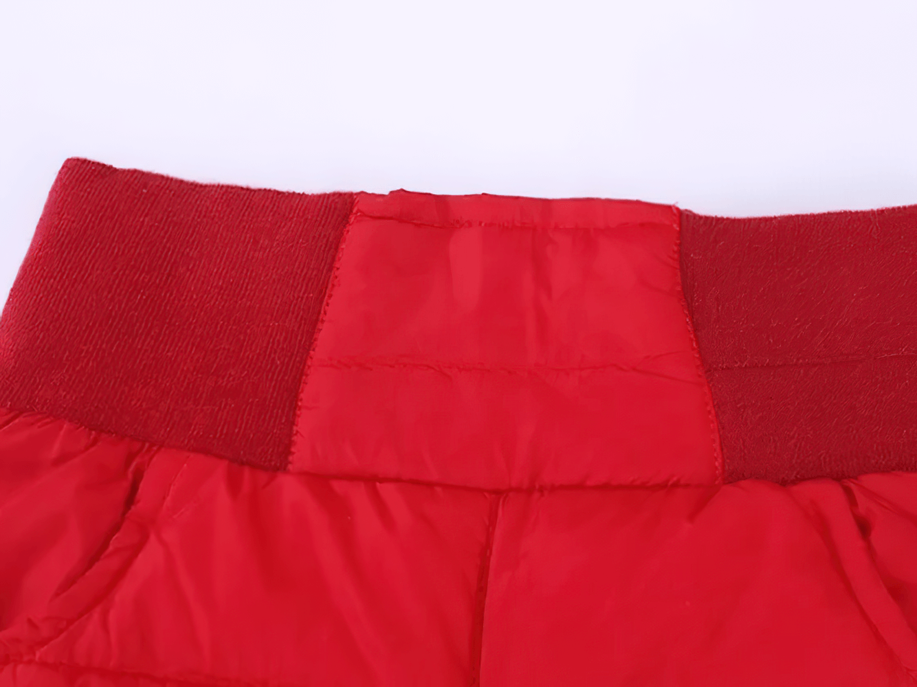 Close-up of Kids Padded Pants with Elastic High Waist - SF3753 showcasing the red elastic waistband for a snug fit.