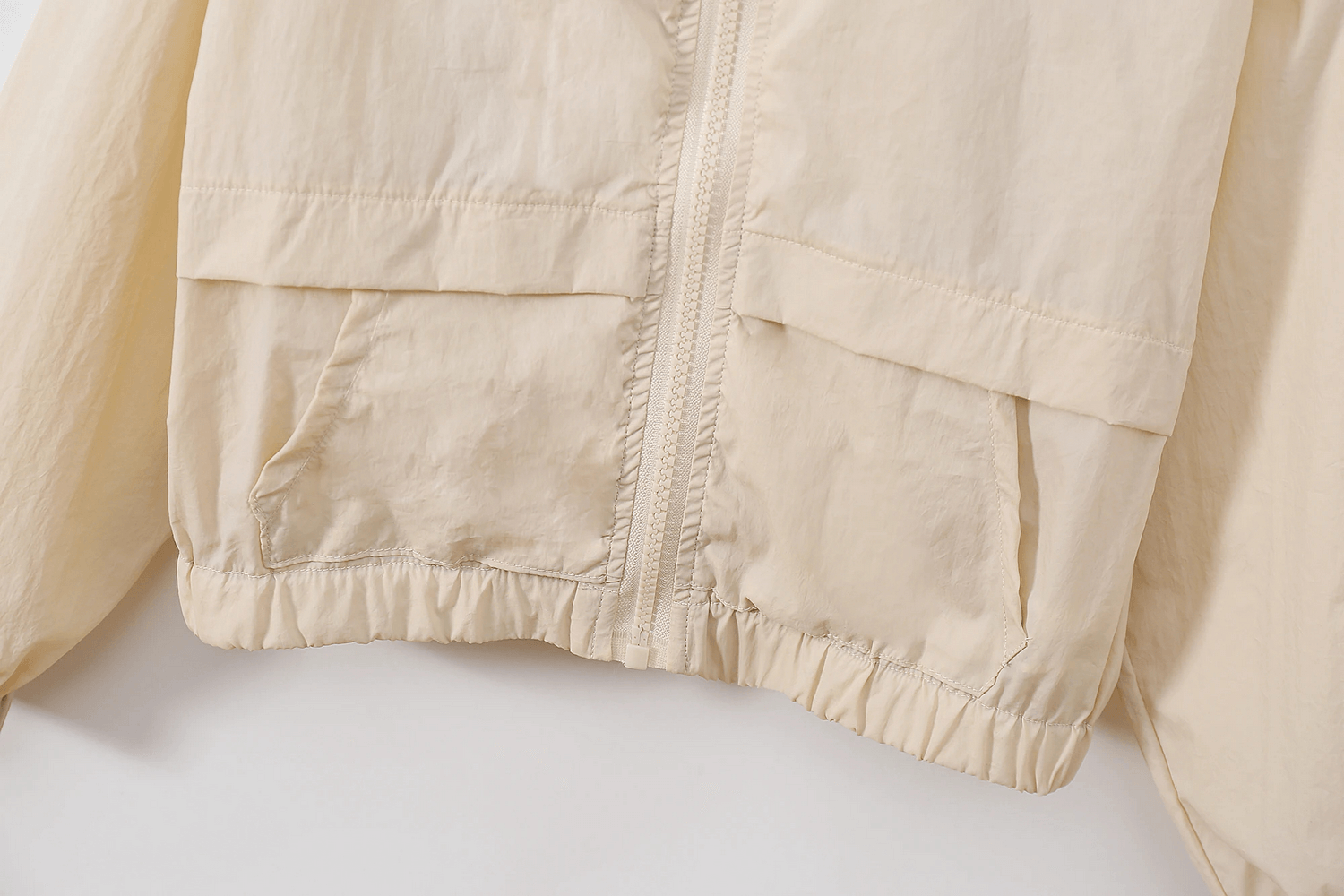 Close-up of Kids Pastel Hooded Windbreaker Jacket With Zipper - SF3651, showcasing zipper and pockets.