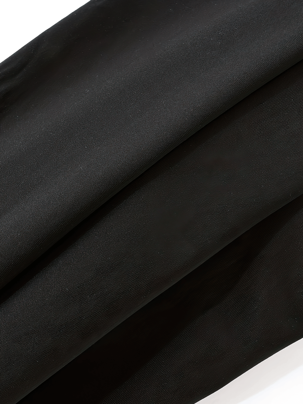 Close-up of Kids Paw Print Sport Leggings with Stretch Waist - SF3796 in black fabric showing soft texture and stretchy material.