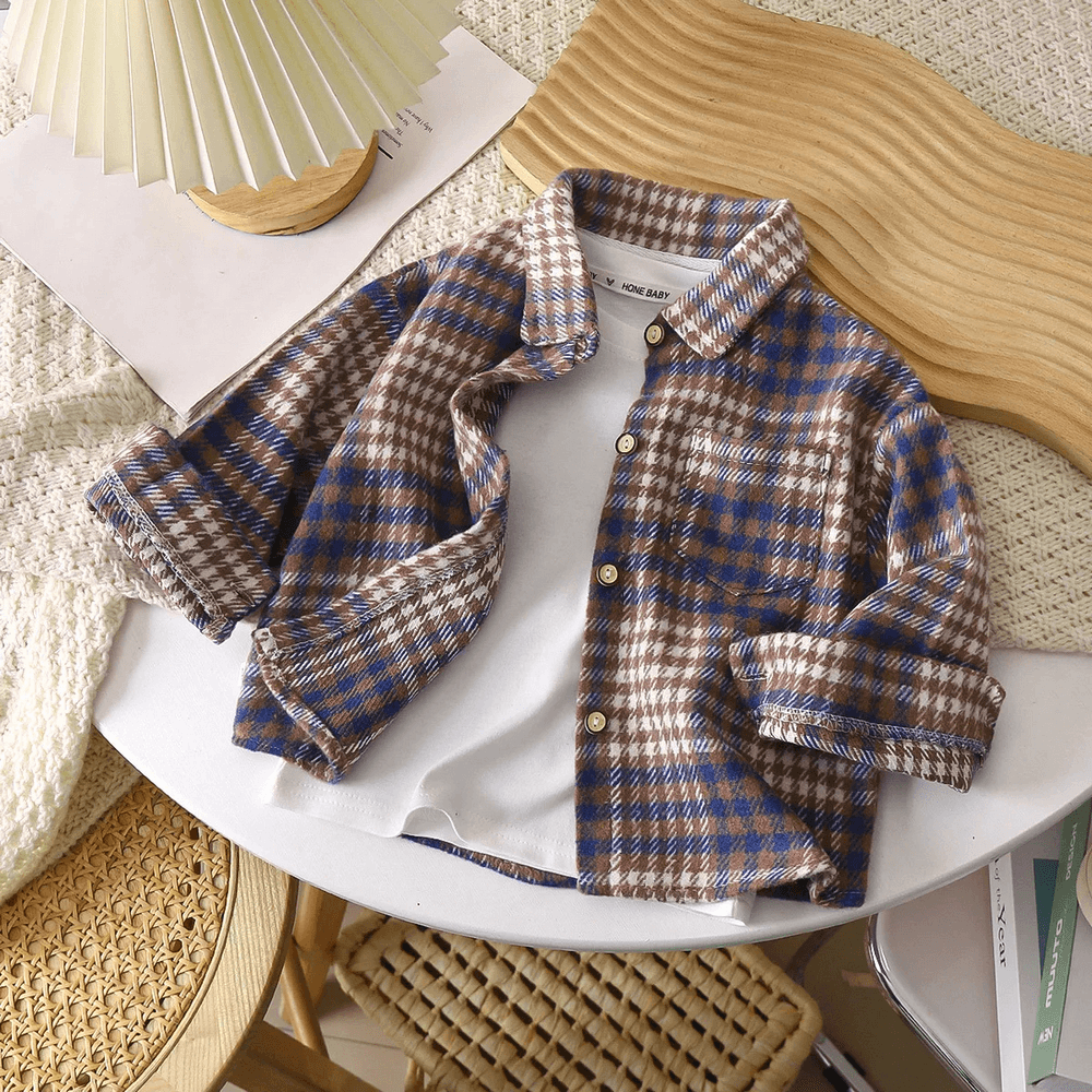 Kids Plaid Flannel Cotton Shirt with Buttons - SF3513 displayed on a table with retro plaid design, perfect for layering in spring and fall.