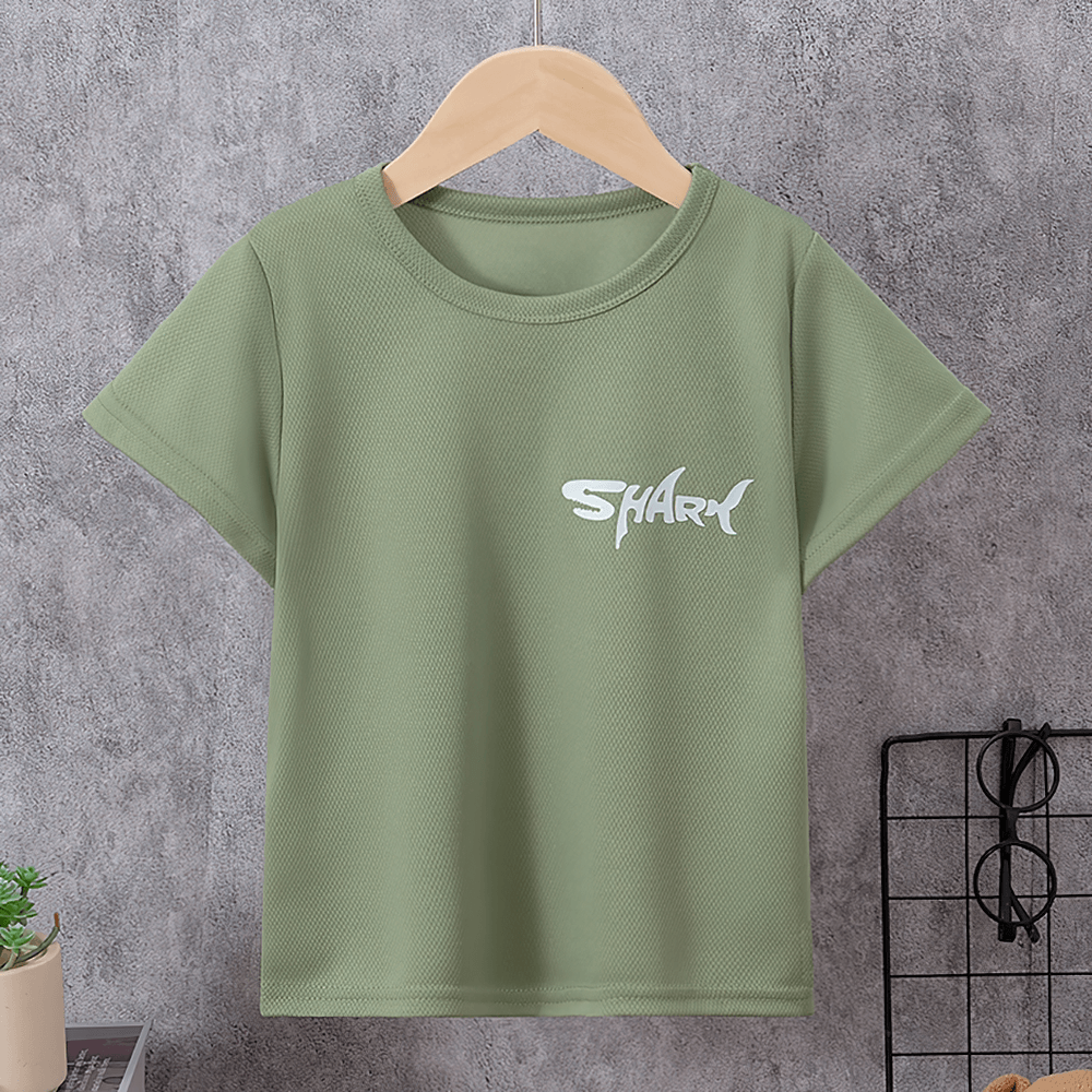 Green kids quick-drying shark print sport t-shirt on hanger, round neck, short sleeves, ideal for active play.