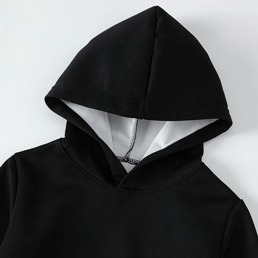 Close-up of a black kids' pullover hoodie with front pocket and hood, ideal for boys and girls' casual wear. Model SF3102.