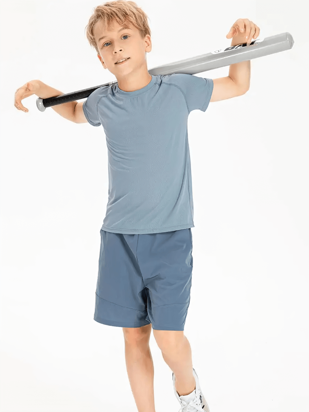 Boy wearing Kids Quick Dry Sports Crewneck Training T-Shirt - SF3854, holding a baseball bat, showcasing active play.