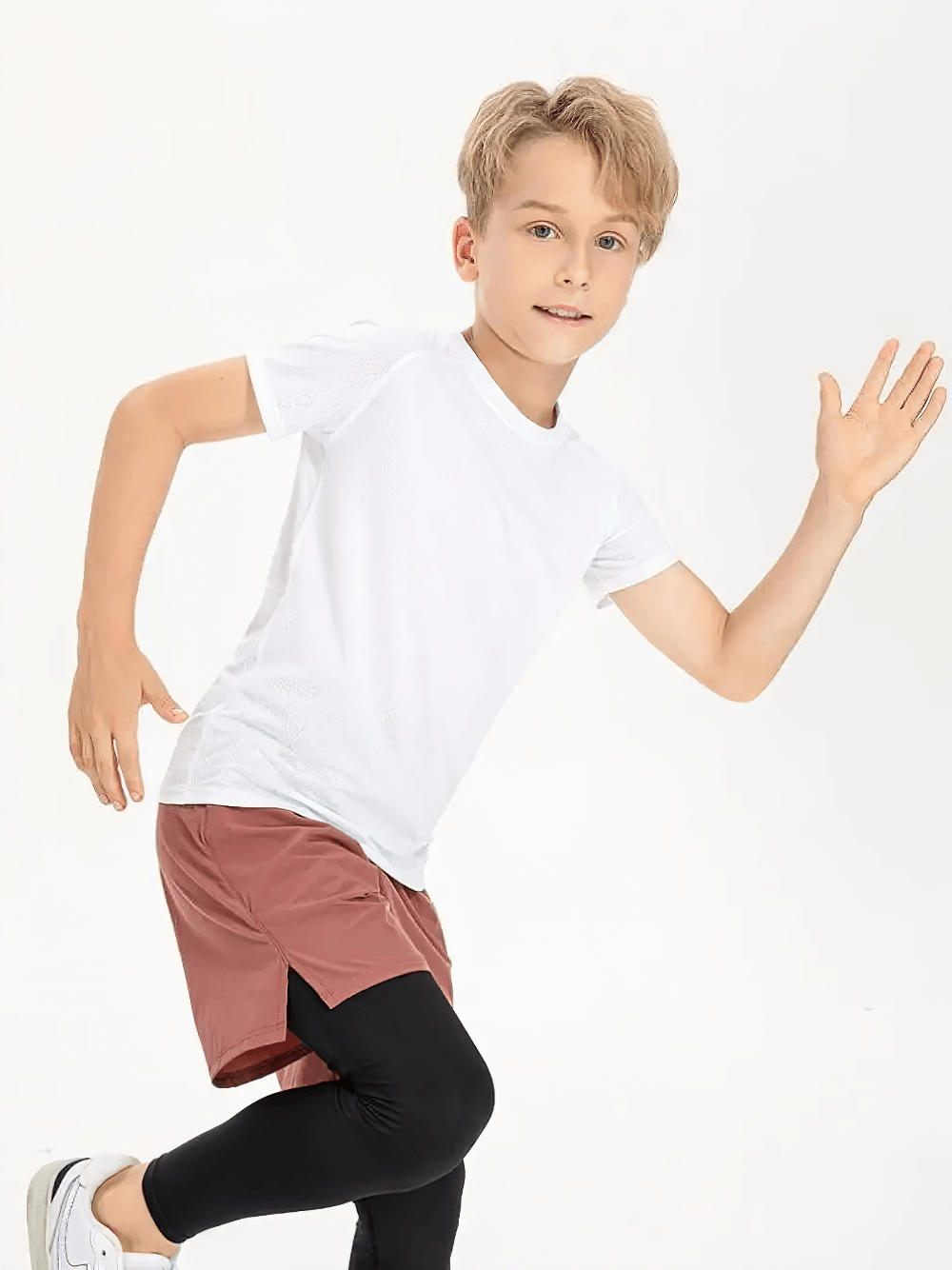 Active kid wearing Kids Quick Dry Sports Crewneck Training T-Shirt - SF3854, running and playing in lightweight athletic tee.