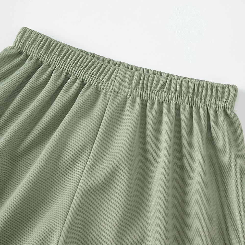 Green kids sport shorts with quick-drying fabric and elastic waistband, part of the 3-piece shark letter print shorts set.