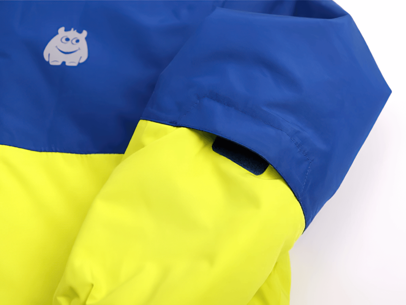 Kids Ski Jacket with Hood and Elastic Cuffs - SF3580 in blue and yellow, featuring windproof design and playful monster graphic.