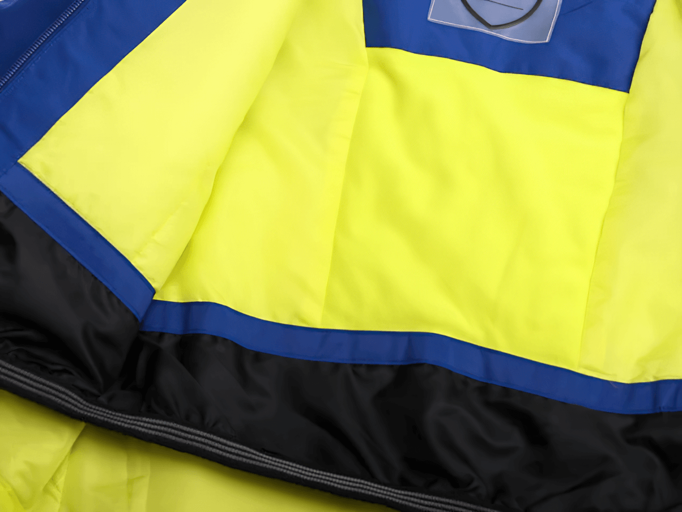 Bright interior of Kids Ski Jacket with Hood and Elastic Cuffs - SF3580, showcasing windproof and insulated design for winter adventures.