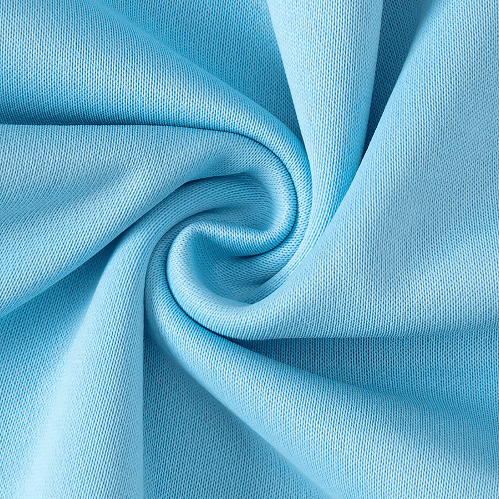 Close-up of blue polyester fabric for kids' solid color sweatshirt, showcasing texture and durability for everyday wear.