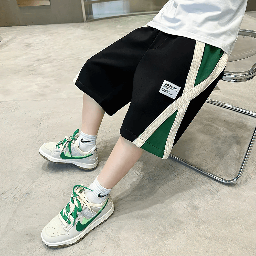 Kids Sport Contrast Panel Elastic Waist Shorts - SF3876 showcasing trendy design with side pockets, perfect for active wear.