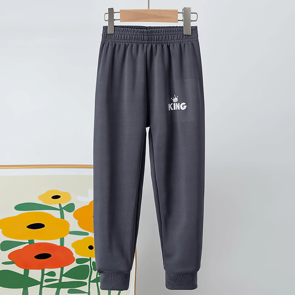 Kids Sport Jogger Sweatpants with Elastic Waist - SF3888 in navy blue, featuring ribbed cuffs and a "KING" logo, perfect for active kids.