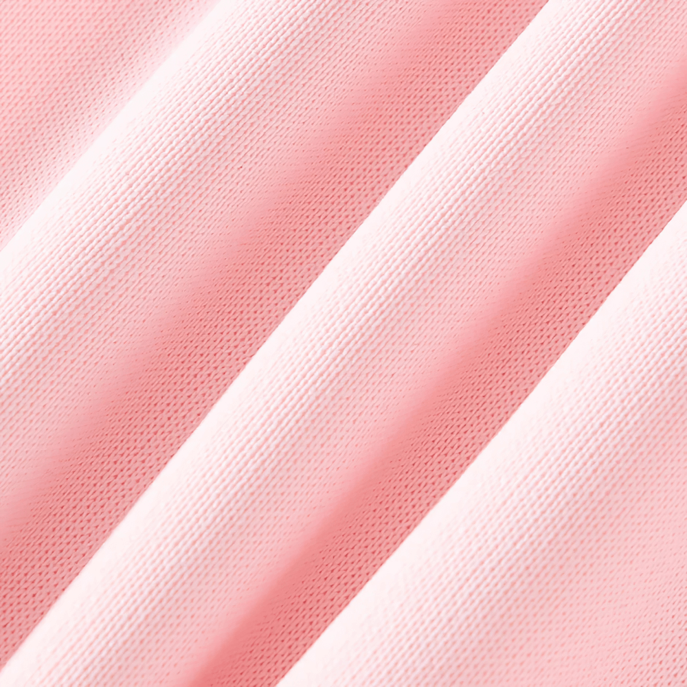 Close-up of soft pink fabric texture used in Kids Sport Jogger Sweatpants with Elastic Waist - SF3888, highlighting knit material.