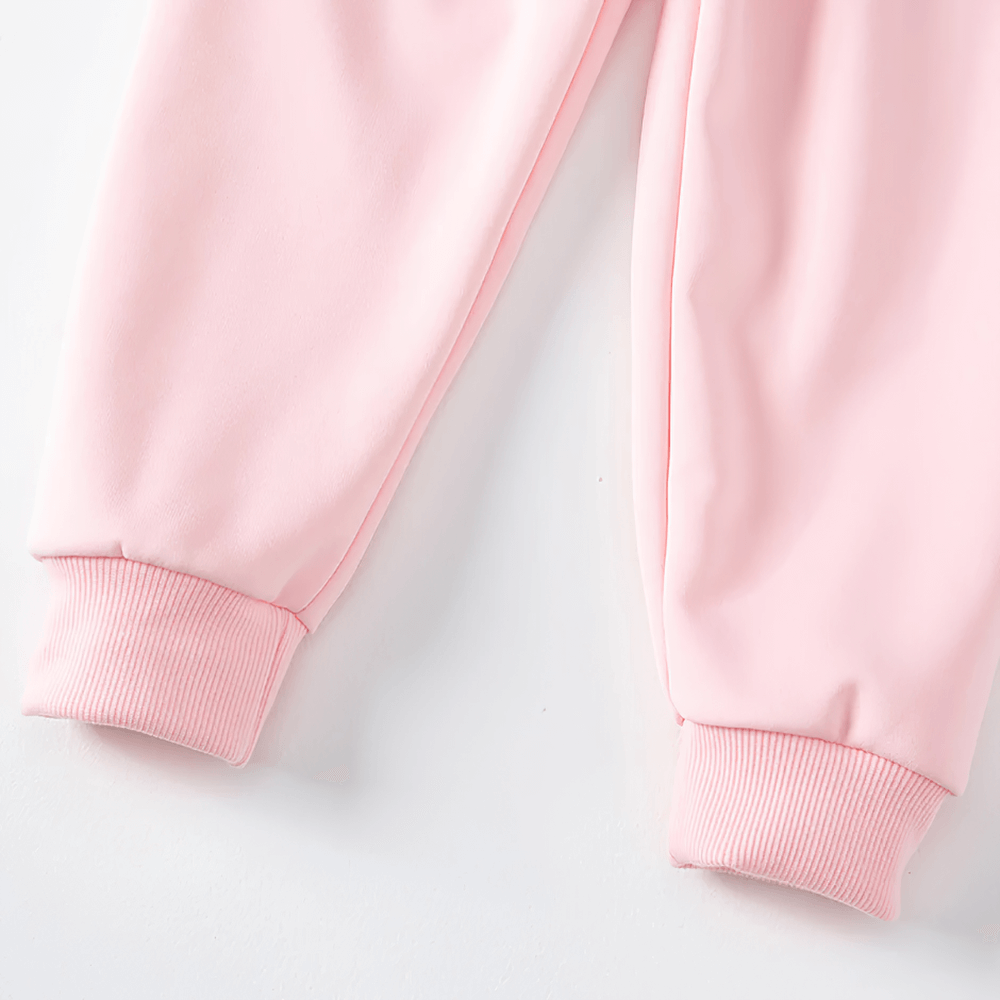 Close-up of Kids Sport Jogger Sweatpants with Elastic Waist - SF3888, featuring ribbed cuffs and a soft pink knit design for active wear.