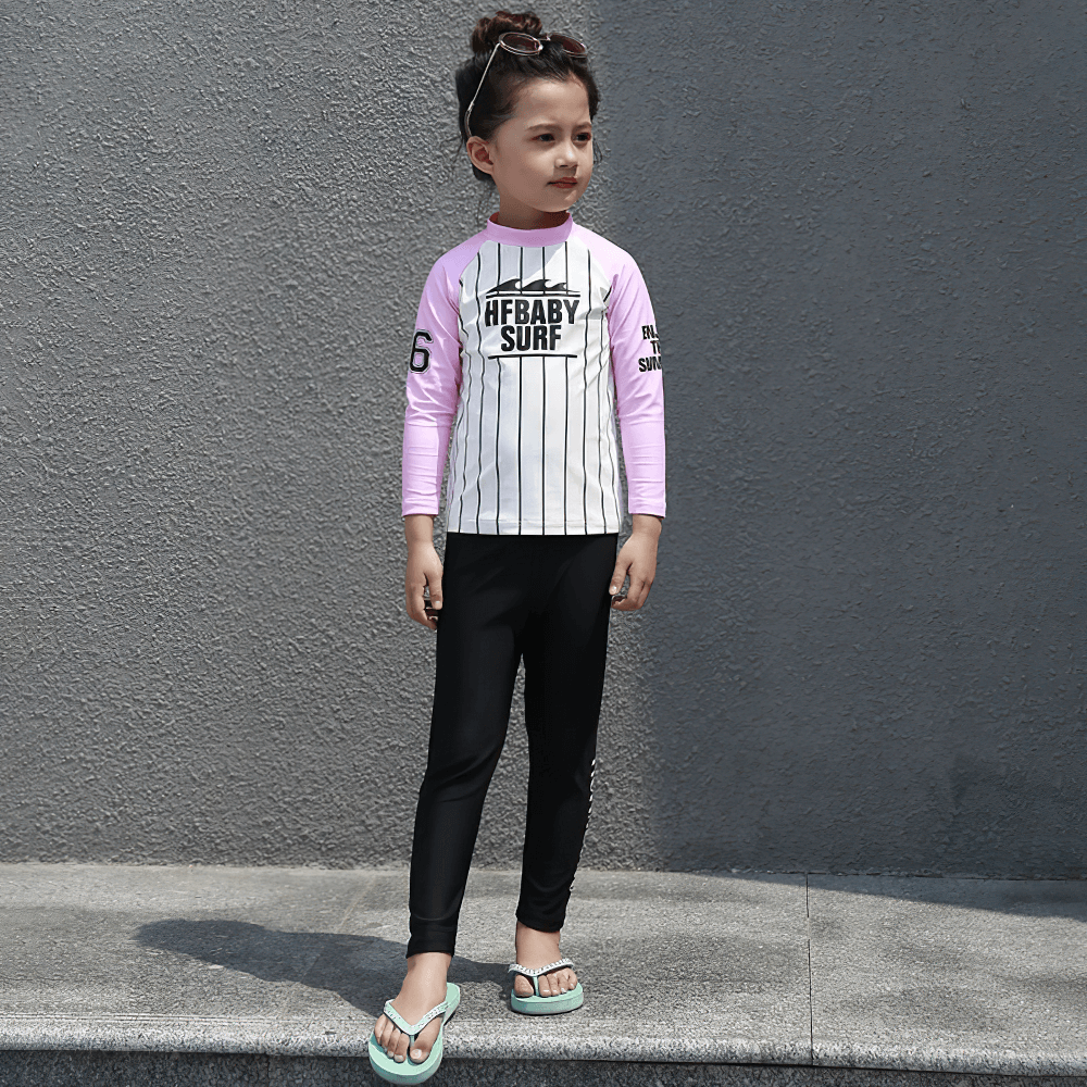 Kid wearing Kid's Sport Long Pants with Quick Dry Fabric - SF3586, UPF50+ sun-protection and quick-dry, black swim pants.