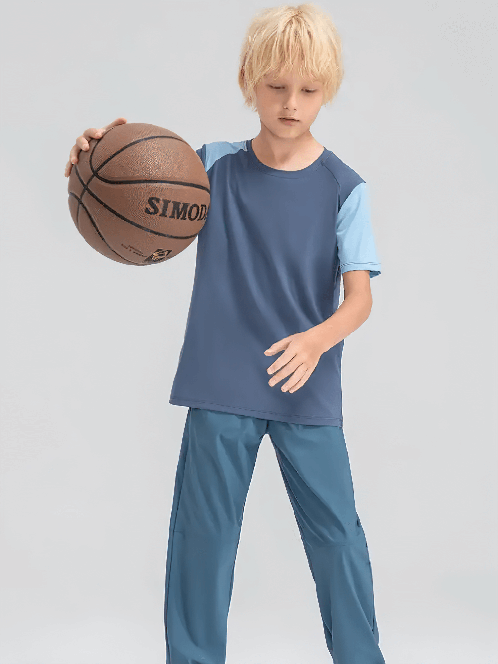Kid playing basketball in Kids Sport T-Shirt with Mixed Color Raglan Sleeves - SF3856