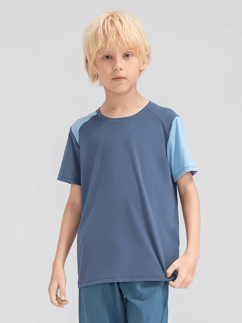 Kids Sport T-Shirt with Mixed Color Raglan Sleeves - SF3856 worn by a child, perfect for outdoor play and training.