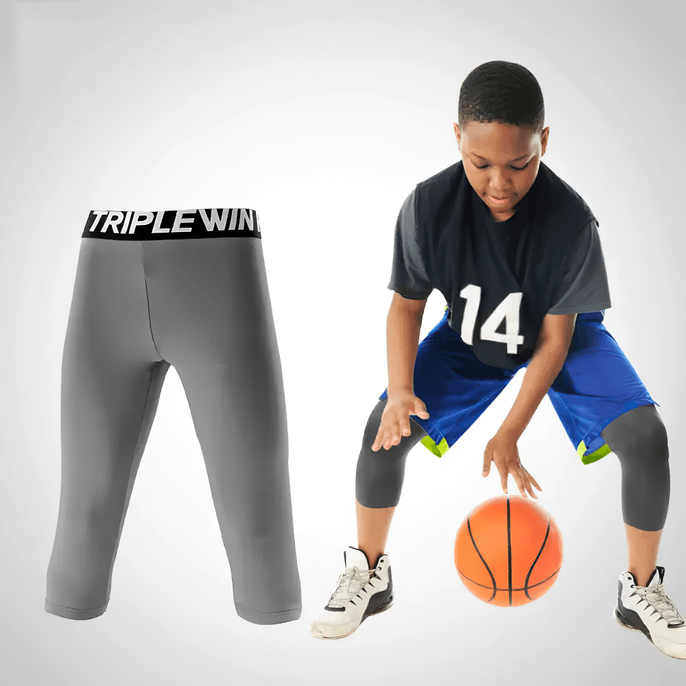 Kids' Sports Capri Leggings for Fitness - SF3624 with boy playing basketball, featuring knee protection and stretchy material for active play.