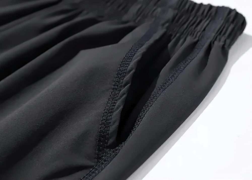 Close-up of Kids' Sports Jogging Pants with Elastic Waistband - SF3618, featuring breathable quick-drying fabric and side pocket.