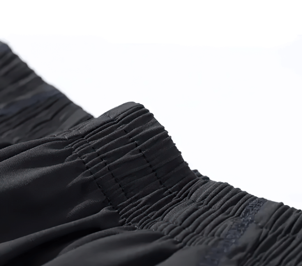 Close-up of Kids' Sports Jogging Pants with Elastic Waistband - SF3618 showing breathable fabric and waistband detail in black.