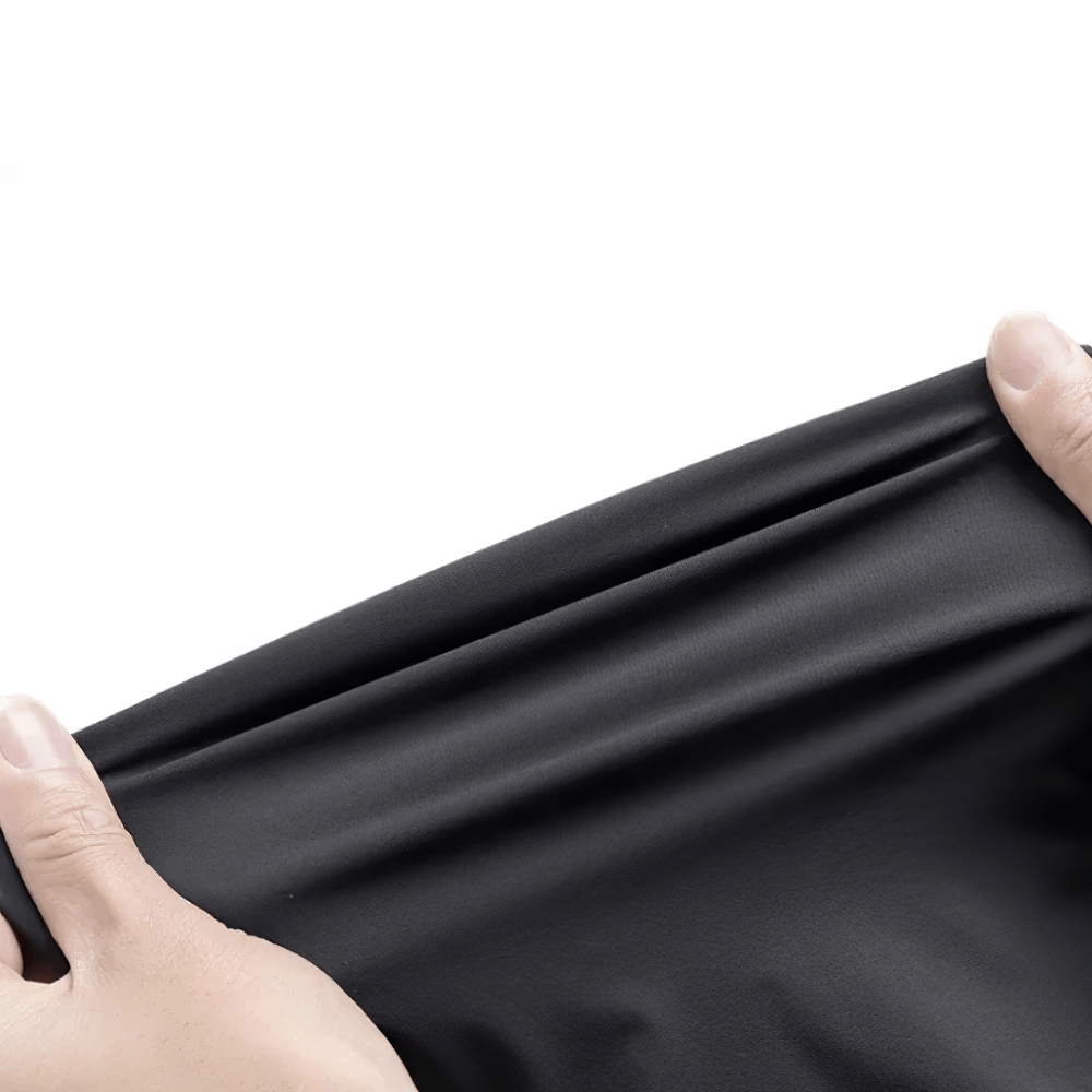 Close-up of ultra-thin fabric stretch for Kids' Sports Jogging Pants with Elastic Waistband - SF3618, demonstrating elasticity and texture.