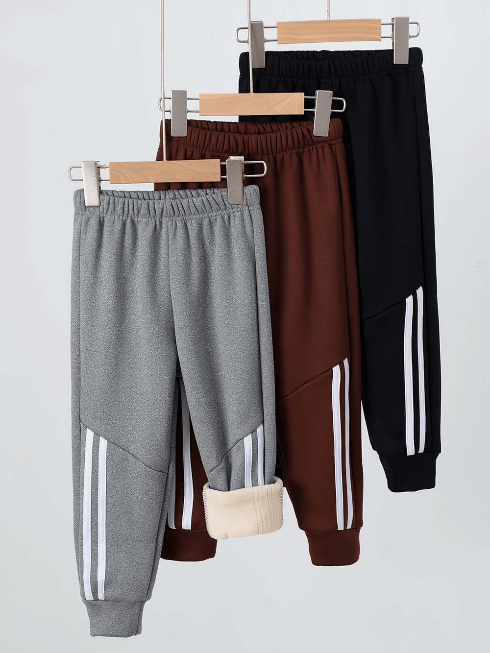 Kids Sports Pants with Plush Lining and Stripes - SF3837 in grey, brown, black with elastic waistband and cozy lining on hangers.