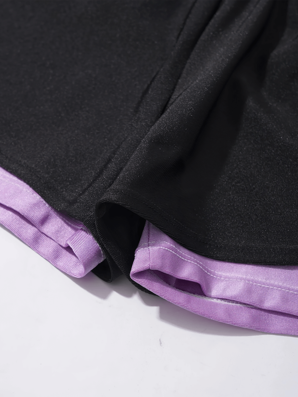 Close-up of Kids Sports Yoga Shorts with Double-Layer Design - SF3783 showcasing durable fabric and vibrant purple layer.