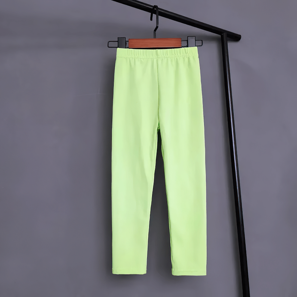 Kids Stretch Leggings in Bright Solid Colors - SF3678 showcasing vibrant green tone on hanger