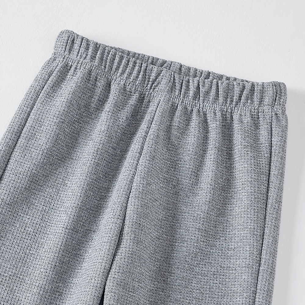 Close-up of Kids Stylish Waffle Knit Sports Jogger Pants - SF3874 in gray with elastic waist and waffle texture.