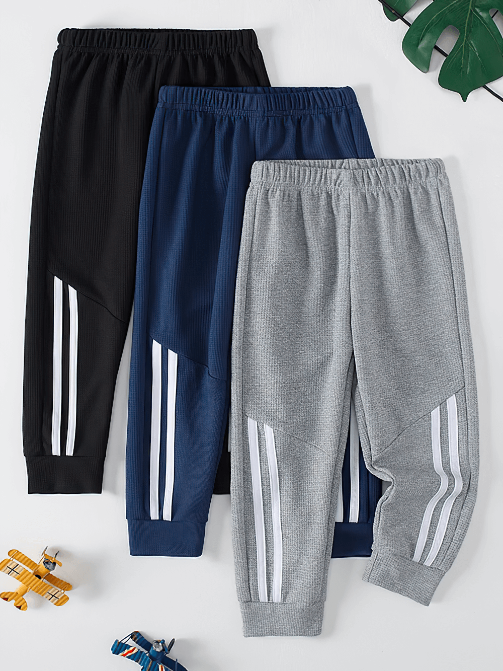 Kids Stylish Waffle Knit Sports Jogger Pants - SF3874 in black, blue, and gray with bold side stripes, elastic waist, and ribbed cuffs
