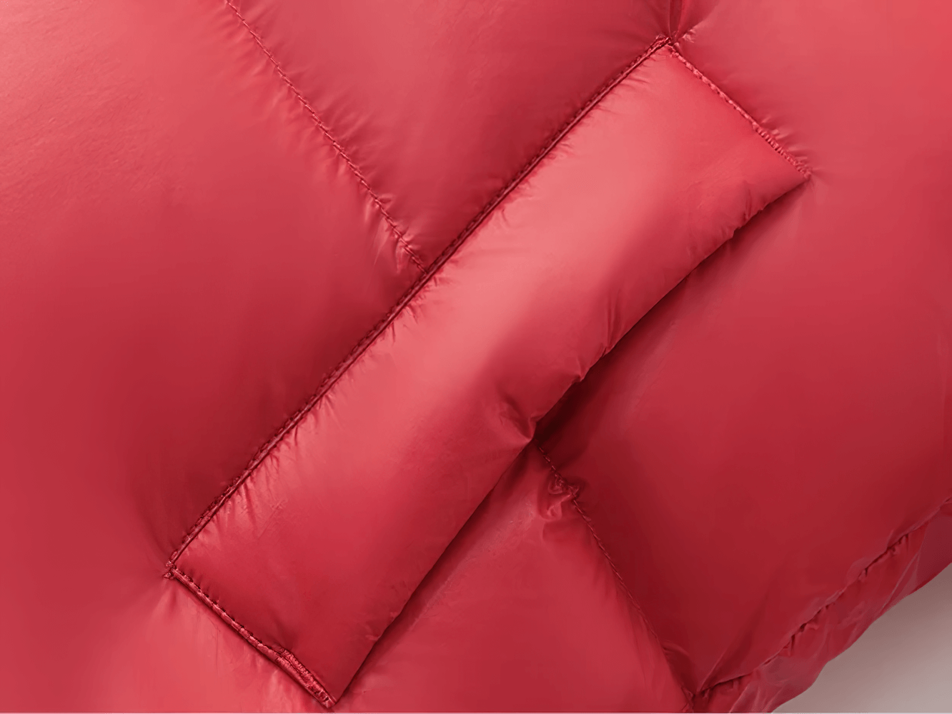 Close-up of red Kids Thermal Down Puffer Jacket with Hood - SF3695, highlighting pocket detail and high-quality stitching. Ideal for cold weather.