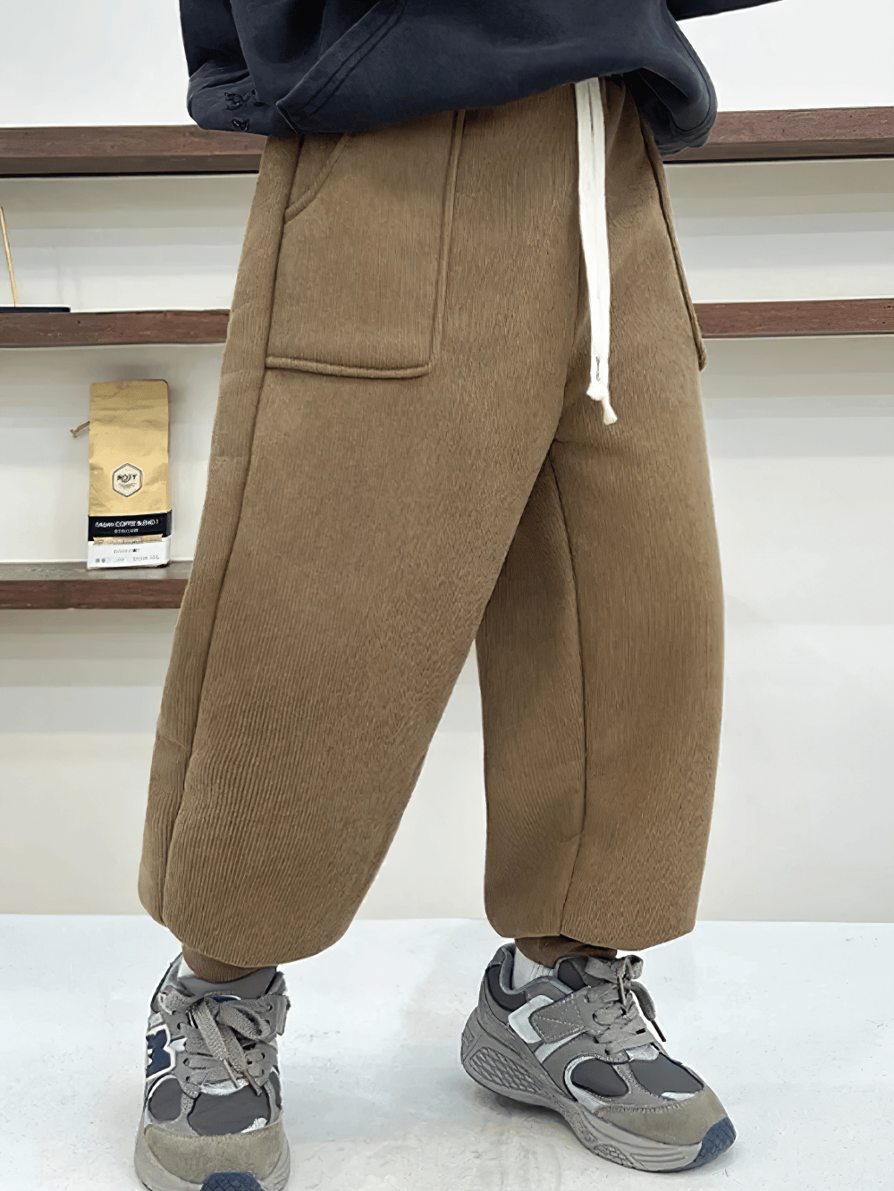 Kids Warm Fleece Pants with Elastic Waist - SF3740 in brown displayed in a stylish setting, highlighting winter comfort and casual design.