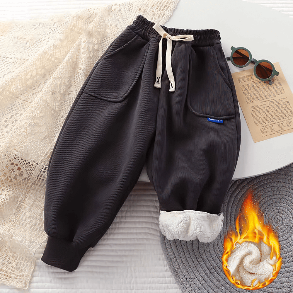 Kids Warm Fleece Pants with Elastic Waist - SF3740 in black with cozy white lining, perfect for winter; styled on a soft blanket.