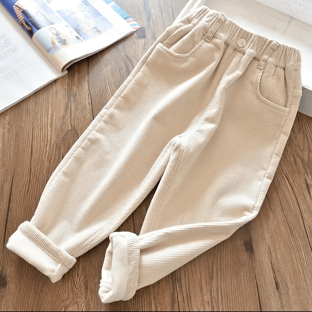 Kids Warm Pants with Elastic Waist and Fleece Lined - SF3803, beige corduroy trousers on wooden floor, perfect for cozy winter wear.