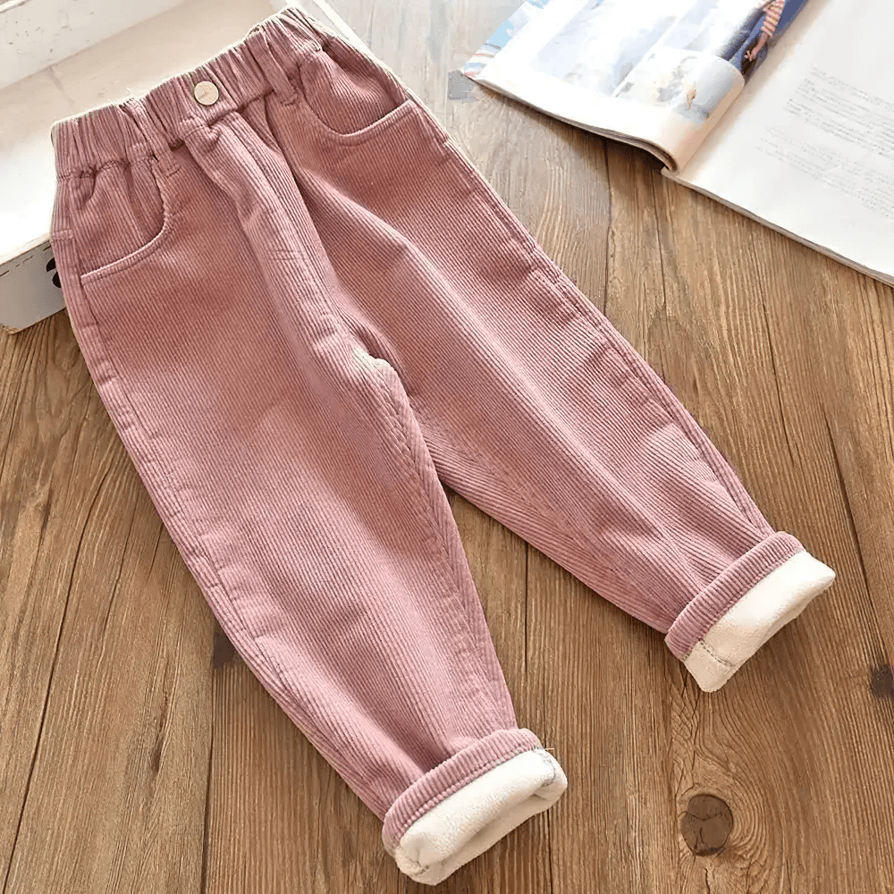 Kids Warm Pants with Elastic Waist and Fleece Lined - SF3803, stylish pink corduroy trousers for boys and girls on a wooden surface.
