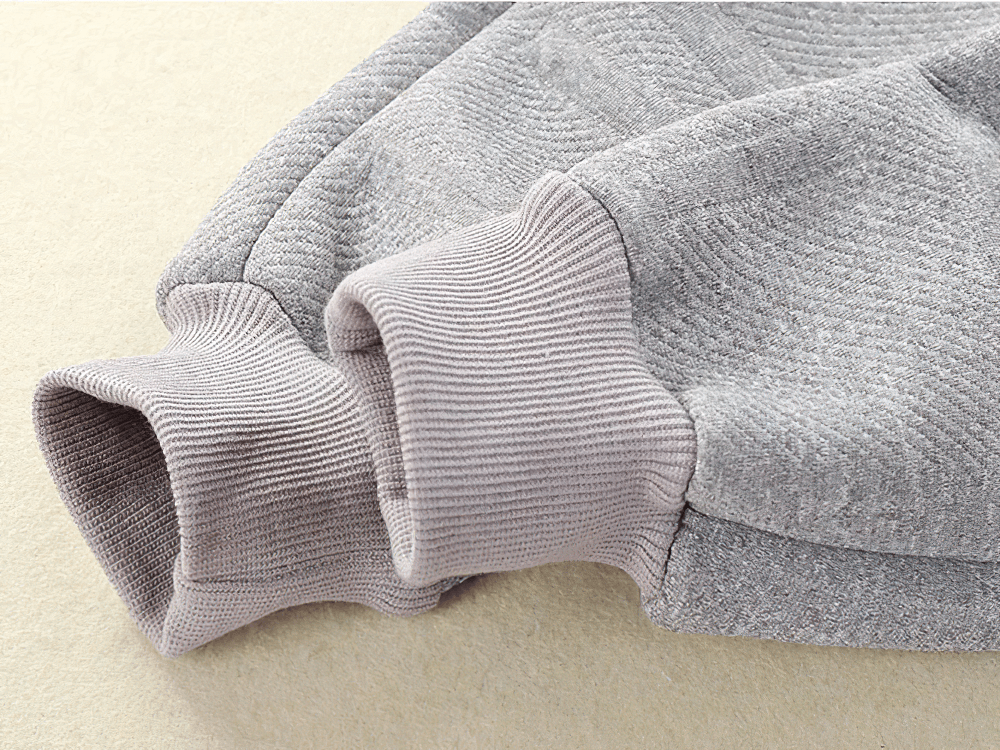 Close-up of ribbed cuff on Kids Warm Sport Jogger Pants with Elastic Waist - SF3884 in light grey fabric.