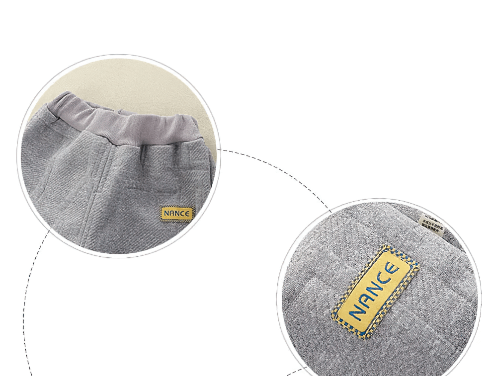 Close-up of Kids Warm Sport Jogger Pants with Elastic Waist - SF3884 featuring elastic waistband and logo patch detail.