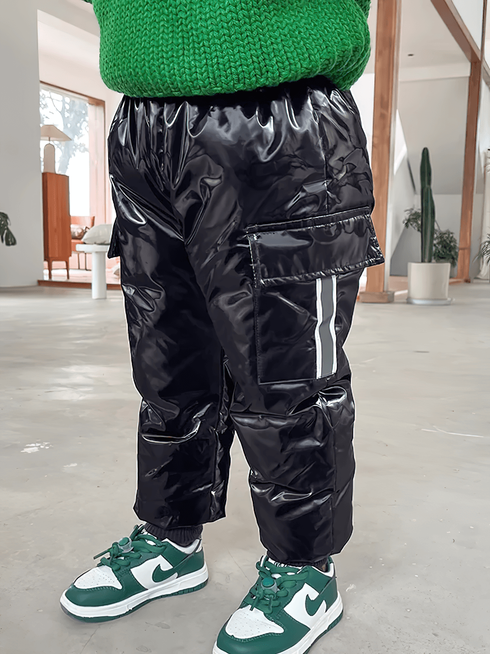 Child wearing Kids Waterproof Cargo Pants with Down Insulation - SF3779 standing indoors