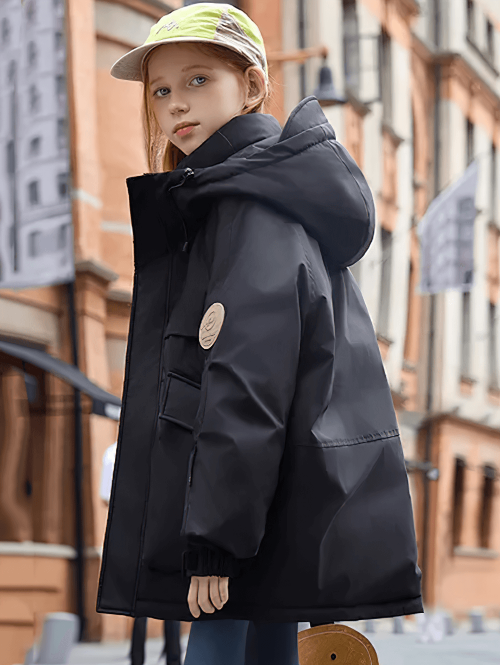 Child wearing a Kids Waterproof Hooded Puffer Jacket with Pockets - SF3632, perfect for keeping warm and dry on a cold day.