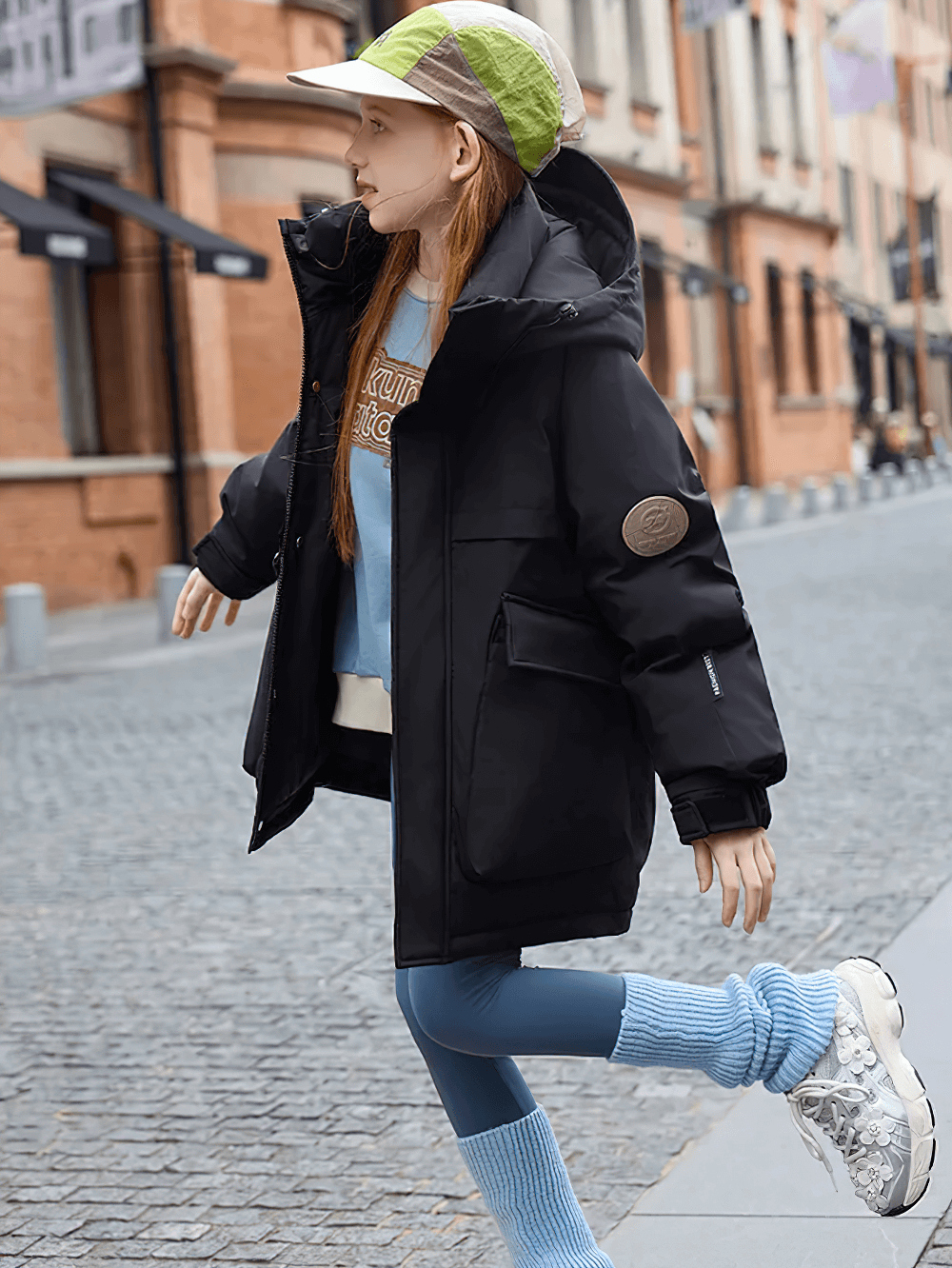 Child wearing Kids Waterproof Hooded Puffer Jacket with Pockets - SF3632 walking on street, showcasing warmth and style.