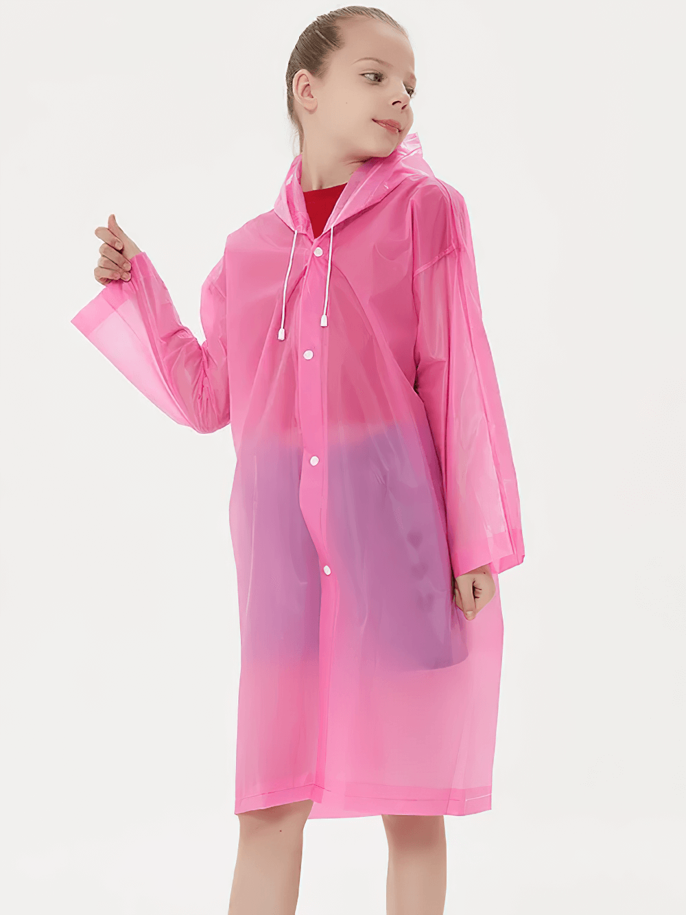 Child wearing pink Kids Waterproof Travel Rain Poncho With Hood - SF3646, showing lightweight, durable design for outdoor rain protection.