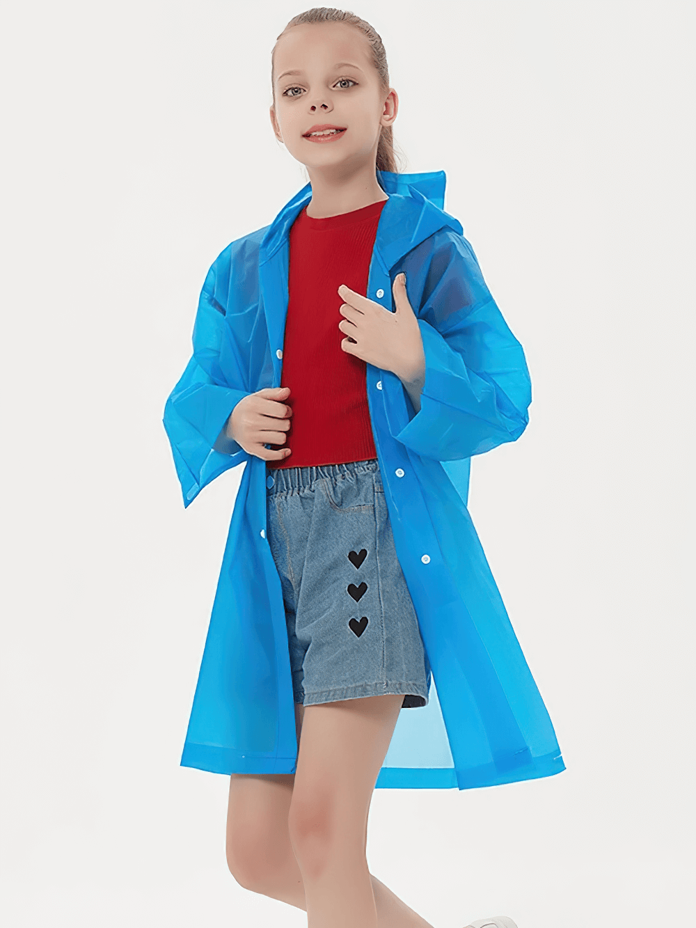 Child wearing Kids Waterproof Travel Rain Poncho With Hood - SF3646 in blue, ideal for hiking and school, lightweight and durable