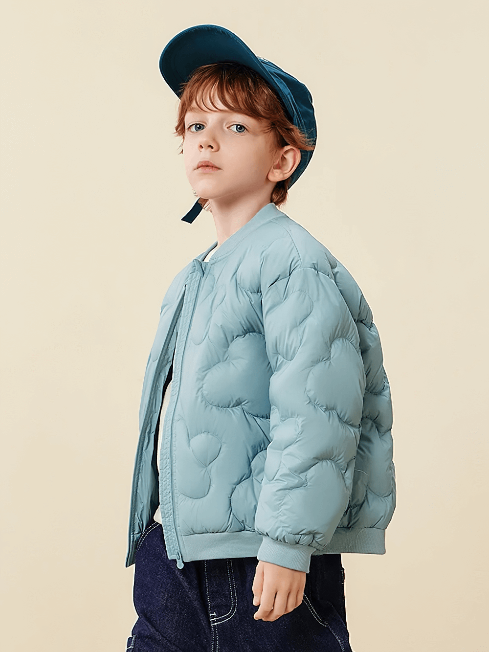 Kid wearing Kids Windproof Down Jacket with Cloud Design - SF3703, featuring quilted cloud pattern and windproof build for outdoor protection.