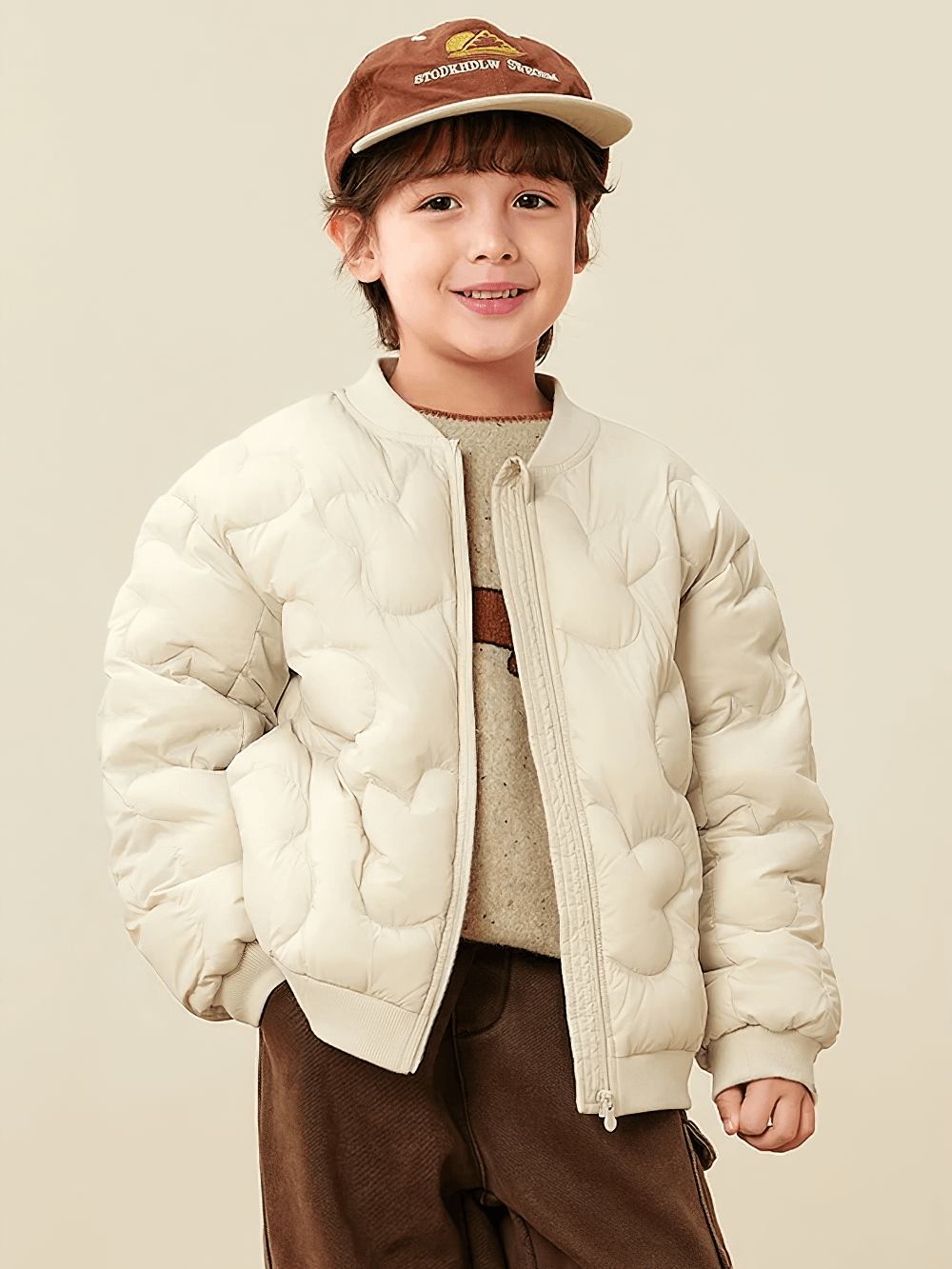 Child wearing Kids Windproof Down Jacket with Cloud Design - SF3703 smiling in cozy cloud-patterned jacket.